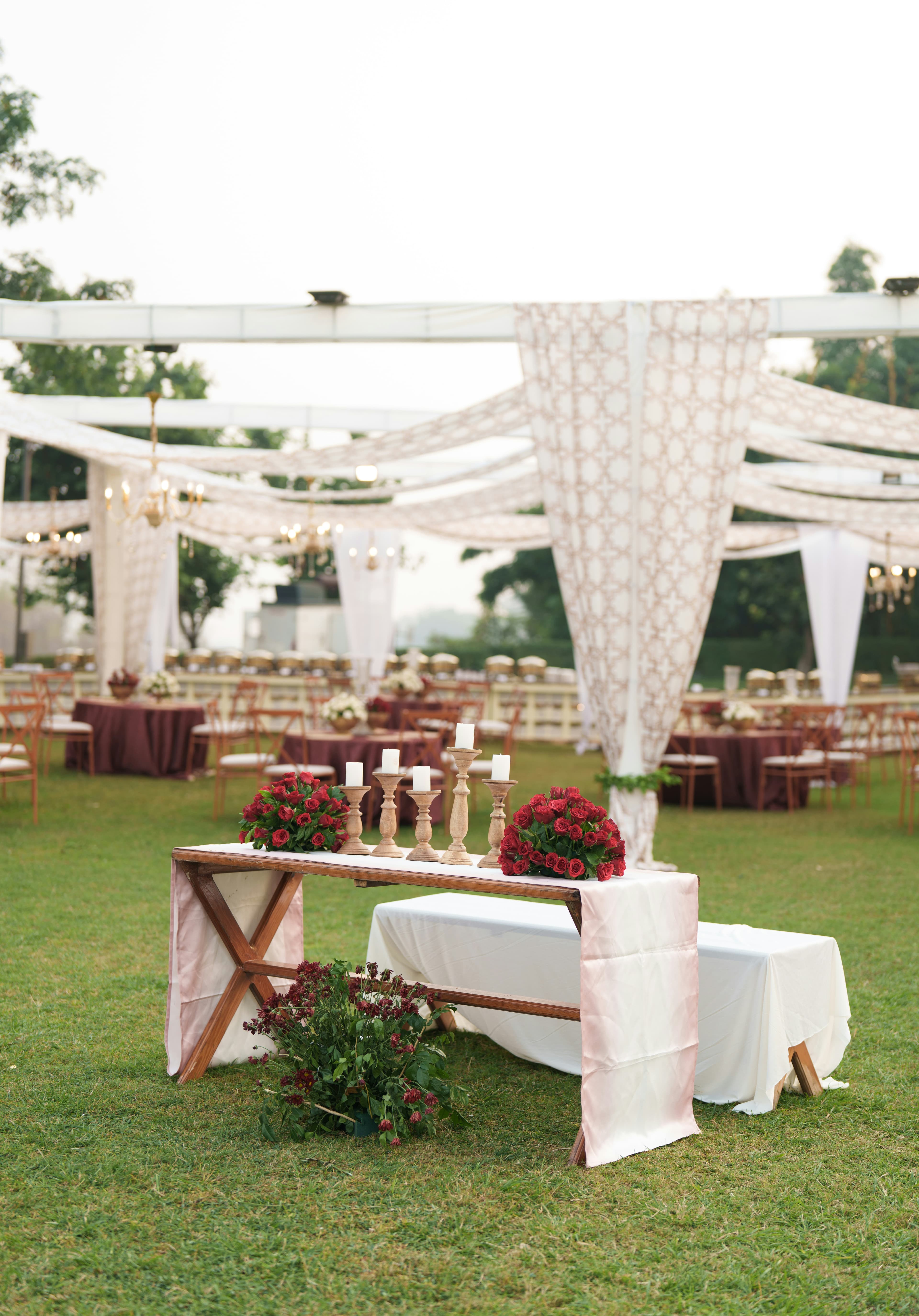 Elegant outdoor Indian wedding reception setup by Thoranam Decor